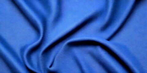 Fototapeta premium a close-up view dark blue fabric, likely silk, with a smooth, flowing texture The fabric appears to be crumpled, giving it a sense of movement and softness The