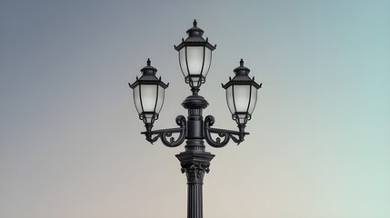 Elegant Black Street Lamp with Three Lights Against a Soft Gradient Sky