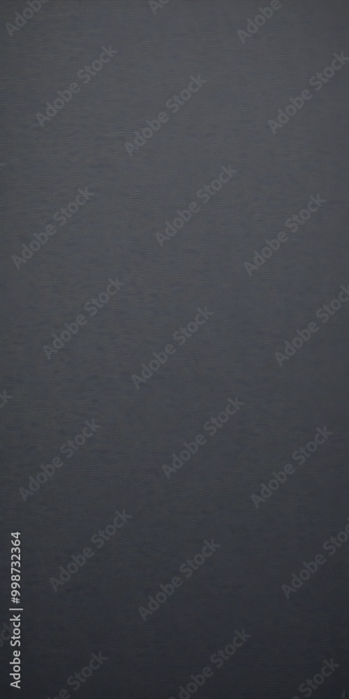 Poster a dark, monochromatic photograph with a gradient effect, featuring a gradient of dark to light shades of gray