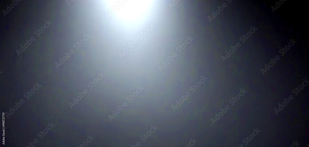 Poster a dark, monochromatic photograph with a gradient effect, featuring a gradient of black and white ton