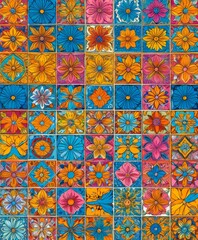 a vibrant collage of colorful tiles featuring various floral designs, including sunflowers, daisies, and other flowers in shades of blue, orange, and pink