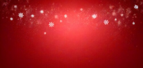 Snowflakes falling against a deep red background