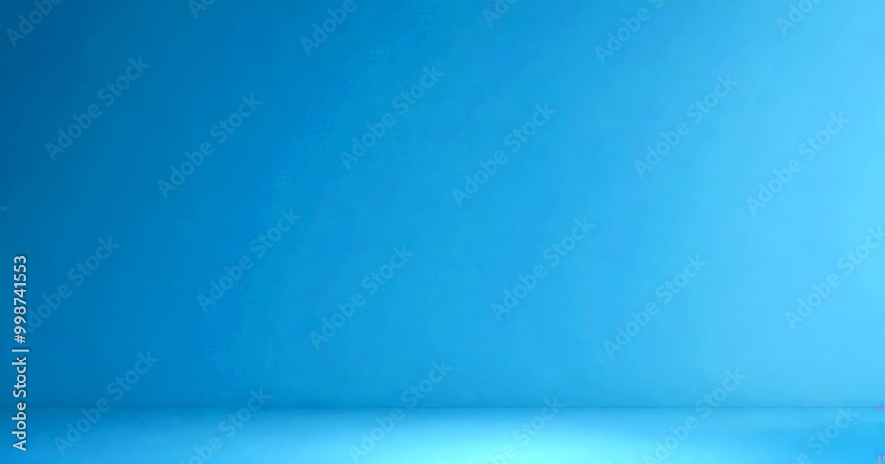 Leinwandbilder a blue background with a gradient effect, transitioning from a darker shade at the top to a lighter one at the bottom