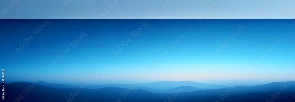 Aufkleber a serene landscape with a clear blue sky and a hazy, mountainous terrain below the mountains appear 