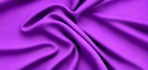 Obraz premium a close-up view purple fabric with a smooth, flowing texture The fabric appears to be made of satin or a similar silky material, and the folds and creases create a sense