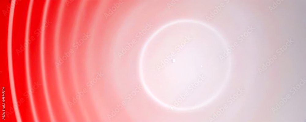Leinwandbilder a gradient background transitioning from red to white, with a central white circle and a small white