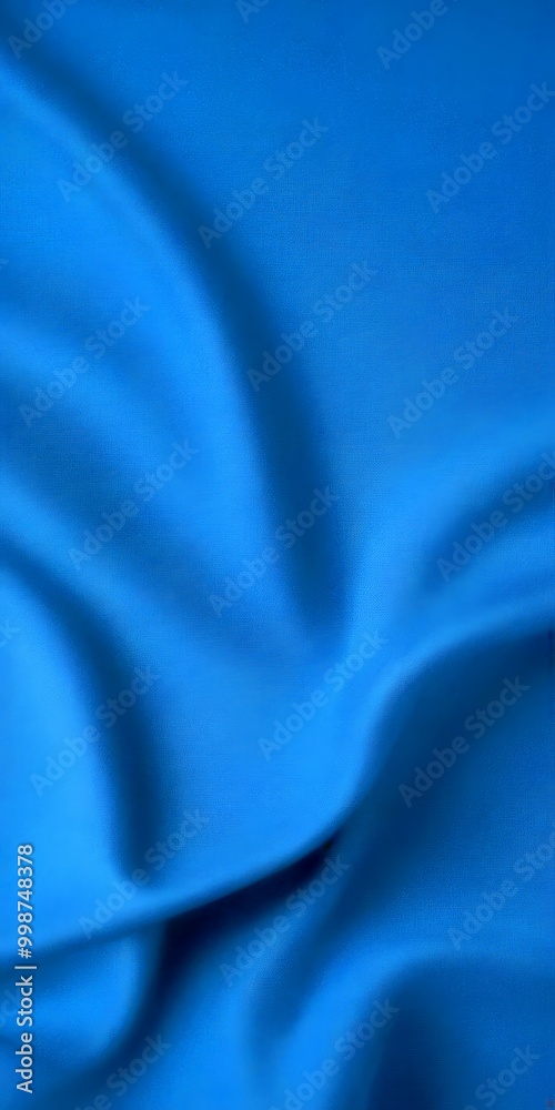 Aufkleber a close-up view blue fabric, with a blurred background that appears to be a gradient of blue, transi