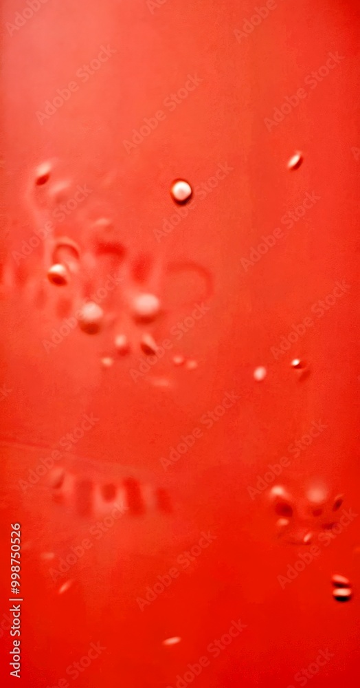 Poster a close-up view pinkish-red surface with small white dots scattered across it, creating a sense of movement and texture