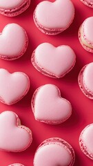 Fototapeta premium French sweet Strawberry Pink,red heart macaroons isolated on pink background. Pastry shop card with copy spacefrench macaroons,Paris Pastry,bakery and branding valentine couple concept,copy space.
