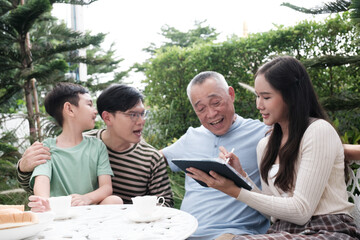Happy Asian Family enjoy spending time in the garden
