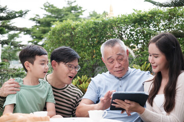 Happy Asian Family enjoy spending time in the garden