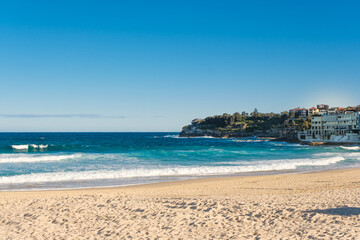 Bondi Beach in Sydney with waves on turquoise colour seawater