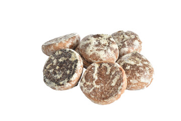Soft and sweet gingerbread cookies, round in shape, lie on a white background.