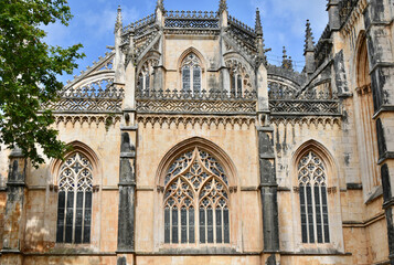Cathedral Windows with Quatrefoil Motif beneath Fleur de Lis Entablature, Batalha Monastery,...