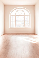 Fototapeta premium Bright and airy empty room with large arched window allowing natural light in during daytime