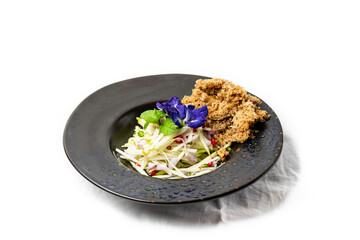 Crispy Catfish Salad in a Dark Plate, Thai Food