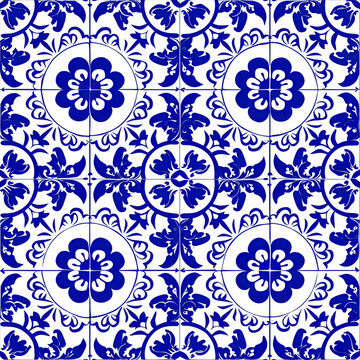Seamless ornate azulejo ceramic tile art pattern wallpaper background backdrop. Blue abstract ornaments, glazed tilework from Spain and Portugal