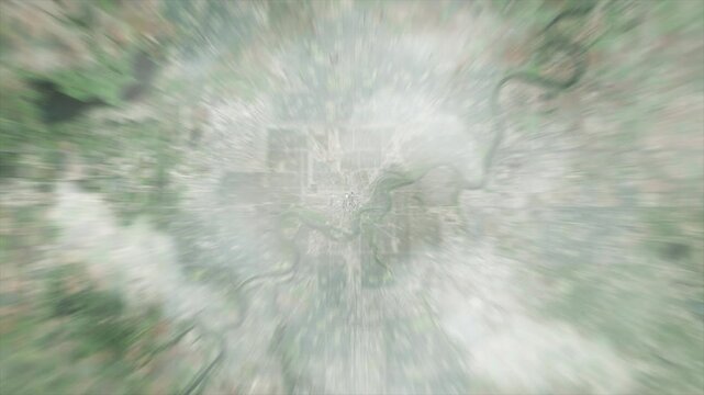Earth zoom from space on Edmonton - Canada. And zoom out through clouds and atmosphere into space. Satellite view.