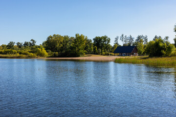 Fototapeta premium Public beach area on Big Marine Lake at Big Marine Park Reserve near Marine On St Croix Minnesota is a Washington County Park for recreation