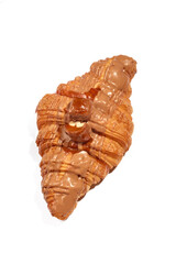 Delicious chocolate drizzled croissant placed on a white background