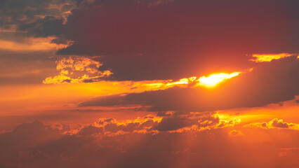 Sky background. Bright evening sunset sky with dramatic clouds.