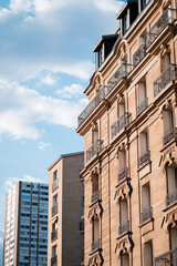 Obraz premium Facade of a Renaissance Haussman Building in Paris France in the Sunset