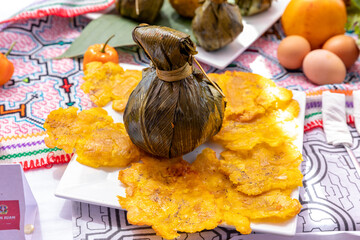 Chicken juane wrapped in bijao leaves. Peruvian jungle food, in all its varieties. Feast of San...
