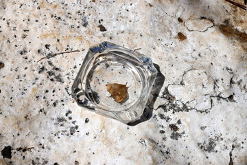 Ashtray for cigarettes and ash when smoking.