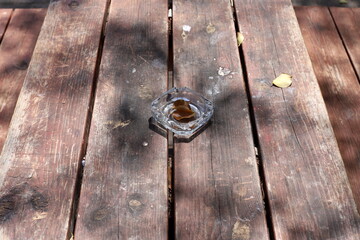 Ashtray for cigarettes and ash when smoking.