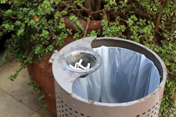 Ashtray for cigarettes and ash when smoking.