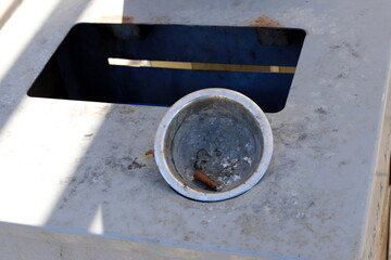 Ashtray for cigarettes and ash when smoking.