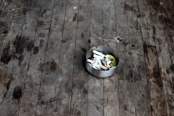 Ashtray for cigarettes and ash when smoking.