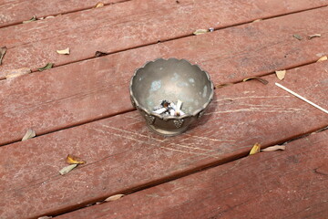 Ashtray for cigarettes and ash when smoking.