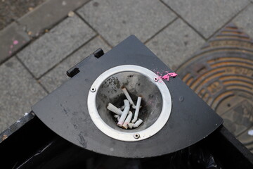 Ashtray for cigarettes and ash when smoking.