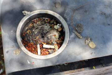 Ashtray for cigarettes and ash when smoking.