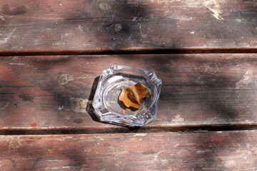 Ashtray for cigarettes and ash when smoking.