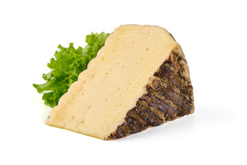 Pieces of cheese tomme de montagne or tomme de savoie cheese, isolated on white background.