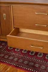 Vintage walnut dresser. Mid-century modern chest of drawers. Interior product photograph.