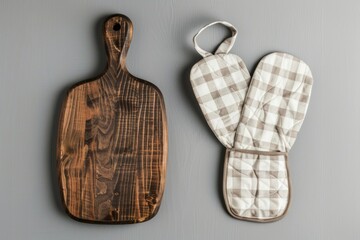 A stylish wooden cutting board and a checkered oven mitt set the scene in this kitchen image. Perfect for cooking enthusiasts and home chefs. Generative AI