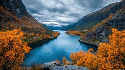 The deep blue water of the lake is surrounded by high cliffs and orange trees, with autumn colors
