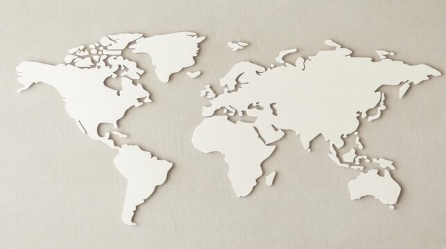 A white world map on a neutral backdrop enhances the aesthetic of the contemporary interior
