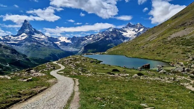most famous hiking routs in Switzerland , Valais canton - five most beautiful mountain lakes in Zermatt. 4k hd video of Stellisee lake and Matterhorn mountain