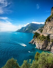 Obraz premium Azure Waters and Rugged Cliffs of the Amalfi Coast, Italy's Coastal Gem