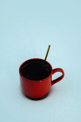 cup of coffee at winter time, cozy atmosphere on the snow