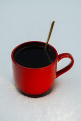 cup of coffee at winter time, cozy atmosphere on the snow