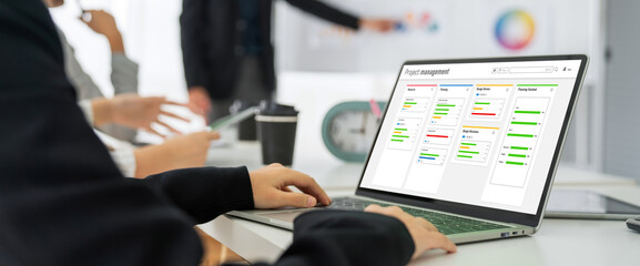 Project planning software for modish business project management on the computer screen showing...