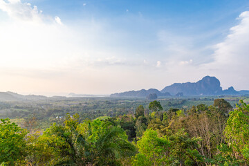 Naklejka premium Panoramic view from the Din Daeng Doi viewpoint. Endless wide valley with hills covered with tropical forests, pointed cliffs.