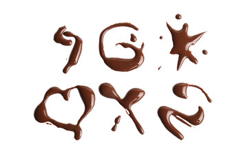 Different sweet chocolate splashes on white background