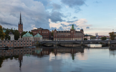 Fototapeta premium Scenic panoramic view of historical centre Riddarholmen with Church, Norstedsts building, Vasabron bridge, House of Nobility and Centralbron street, Gamla Stan, Stockholm, Sweden