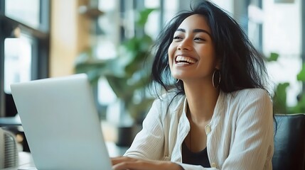  Happy young woman working remotely on a virtual video team meeting call, remote work and flexible culture concept. Inclusive and diverse dei workplace with a blasian african american businesswoman 